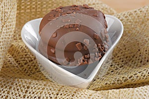 chocolate bonbon with dulce de leche delicious caramel sugar filling isolated caloric