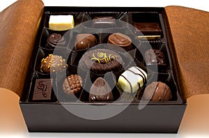 Chocolate bonbons in box photo