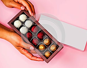 Chocolate box in hands