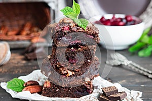 Chocolate brownie with berries and nuts