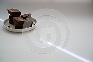 Chocolate brownie bits with place for text