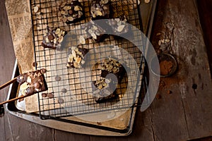 Chocolate brownie cake with nuts on a rustic metal background,Directly above