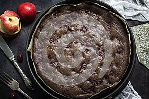 Chocolate brownie cheesecake on dark background. Selective focus