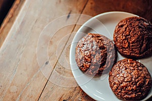 Chocolate brownie cookies in plate  on wood table,Delicious homemade