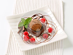 Chocolate Brownie with ice cream and raspberries