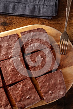 Chocolate brownie, simple coffee cake, overhead flat lay view