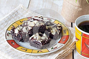 Chocolate brownies cake and cup of coffee