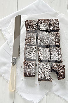 Chocolate brownies with knife