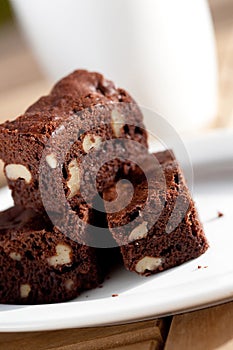 Chocolate brownies with pecan nut on plate