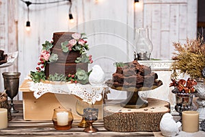 Chocolate brownies in stacked on wooden table