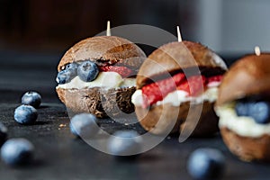 Chocolate burgers. Sweet burgers. Dessert for kids.