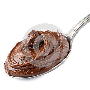 Chocolate butter on spoon isolated on white background photo