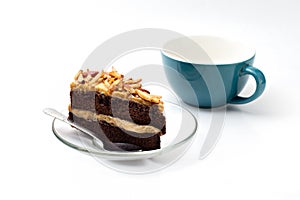 Chocolate cake almonds with coffee cup