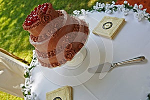 Chocolate cake with cherries sitting on a table