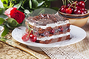 Chocolate cake with cherry, cherry cake and cream slice elegant still life close-up