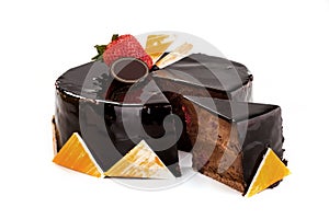 Chocolate cake with  chocolate, cream on a white background photo