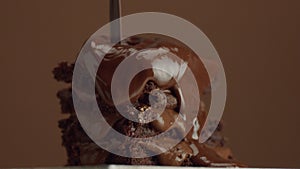 Chocolate cake with chocolte cream with different texture