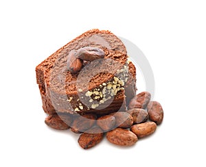 Chocolate cake and cocoa beans