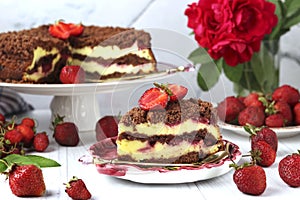 Chocolate cake with cottage cheese with strawberries is located on a white background with piece of cake in the foreground,