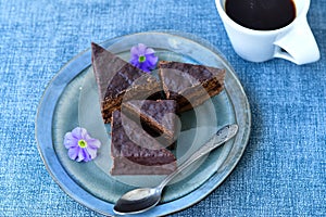 Chocolate cake and cup of coffee