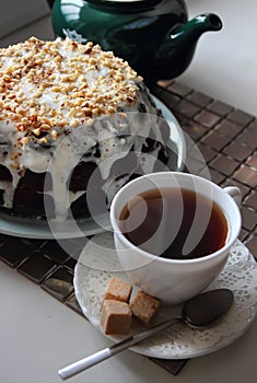 Chocolate cake decorated with walnut crumbs