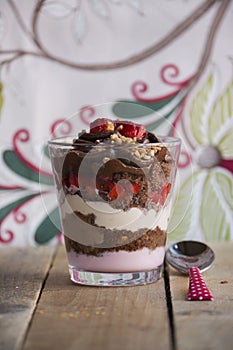 Chocolate cake dessert, yogurt and strawberries