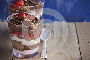 Chocolate cake dessert, yogurt and strawberries