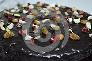 Chocolate cake with dry fruits toppings