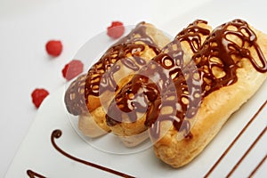 Chocolate cake (eclair) closeup