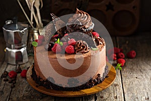 Chocolate cake with ganache frosting and raspberry