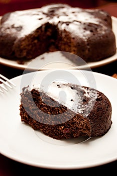 Chocolate cake with icing sugar