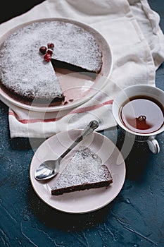Chocolate cake Kladdkaka with a cup of tea