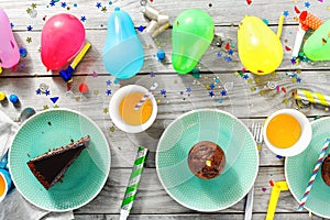 Chocolate cake muffins decoration party top view children birthday table