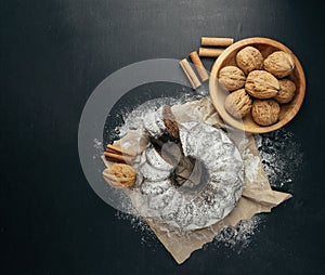 Chocolate cake . pastry products with flour on black background.  food and bakery concept. banner ,copy space