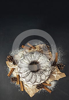 Chocolate cake . pastry products with flour on black background.  food and bakery concept. banner ,copy space