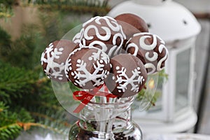 Chocolate cake pops in christmas setting