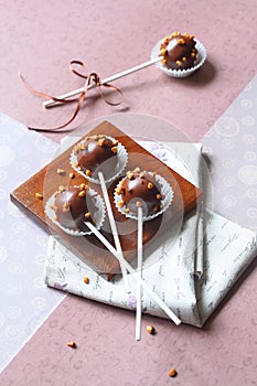 Chocolate Cake Pops sprinkled with nuts