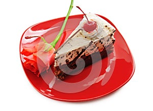 Chocolate cake on red dish