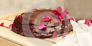 Chocolate cake Sachertorte decorated with flowers