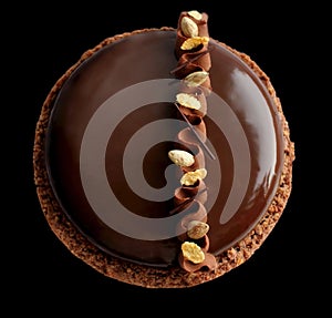 Chocolate cake with shiny mirror glaze, ganache and almonds