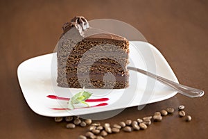 Chocolate Cake Slice with brown background photo