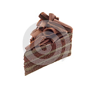 Chocolate cake slice with curl on white background