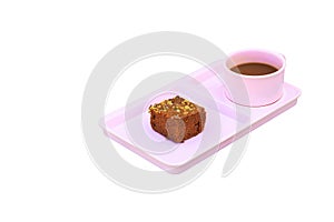 Chocolate cake Sprinkle with nuts and coffee cup in pink saucer on isolated on white background