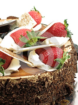 Chocolate cake with strawberries topping