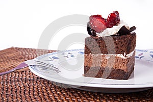 Chocolate cake with strawberry and fork