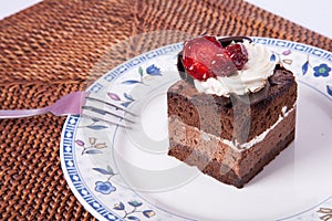 Chocolate cake with strawberry and fork