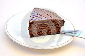 Chocolate cake temptation concept .confort food photo