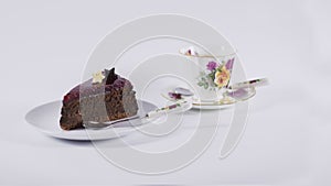 Chocolate cake on white plate