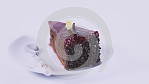 Chocolate cake on white plate