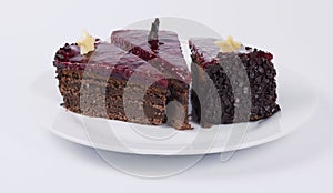 Chocolate cake on white plate